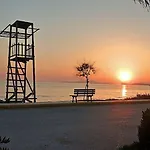 Апартаменты Kokkinos Ариллас